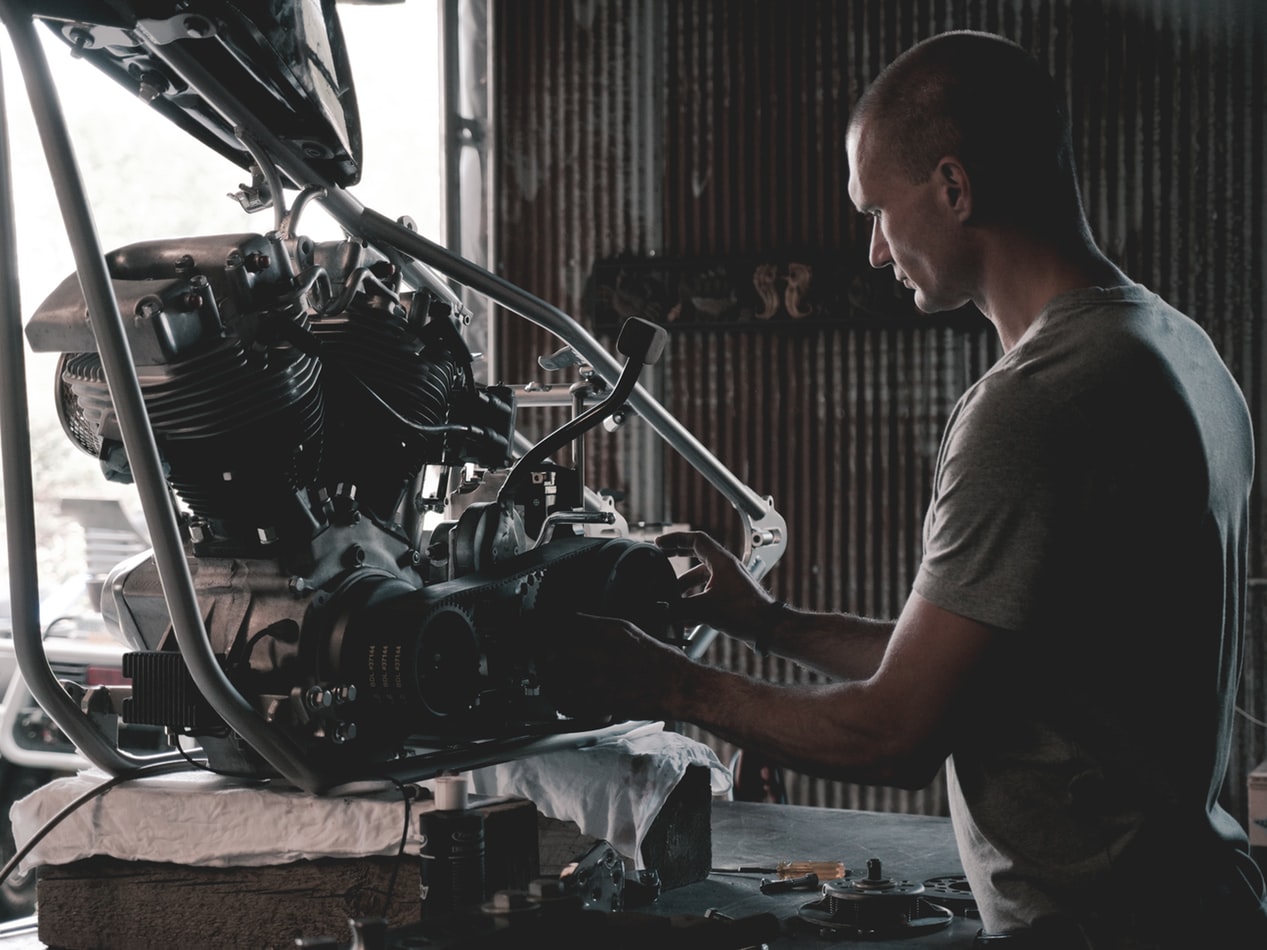 mechanic working on car